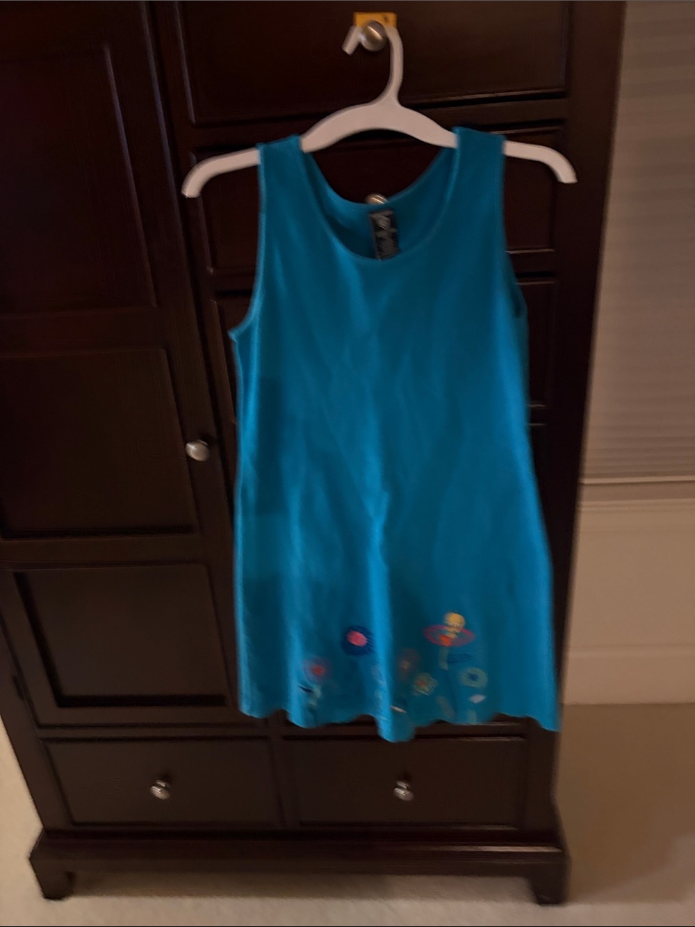 Warner Bros. Teal Sleeveless Mini Dress with Floral Hem